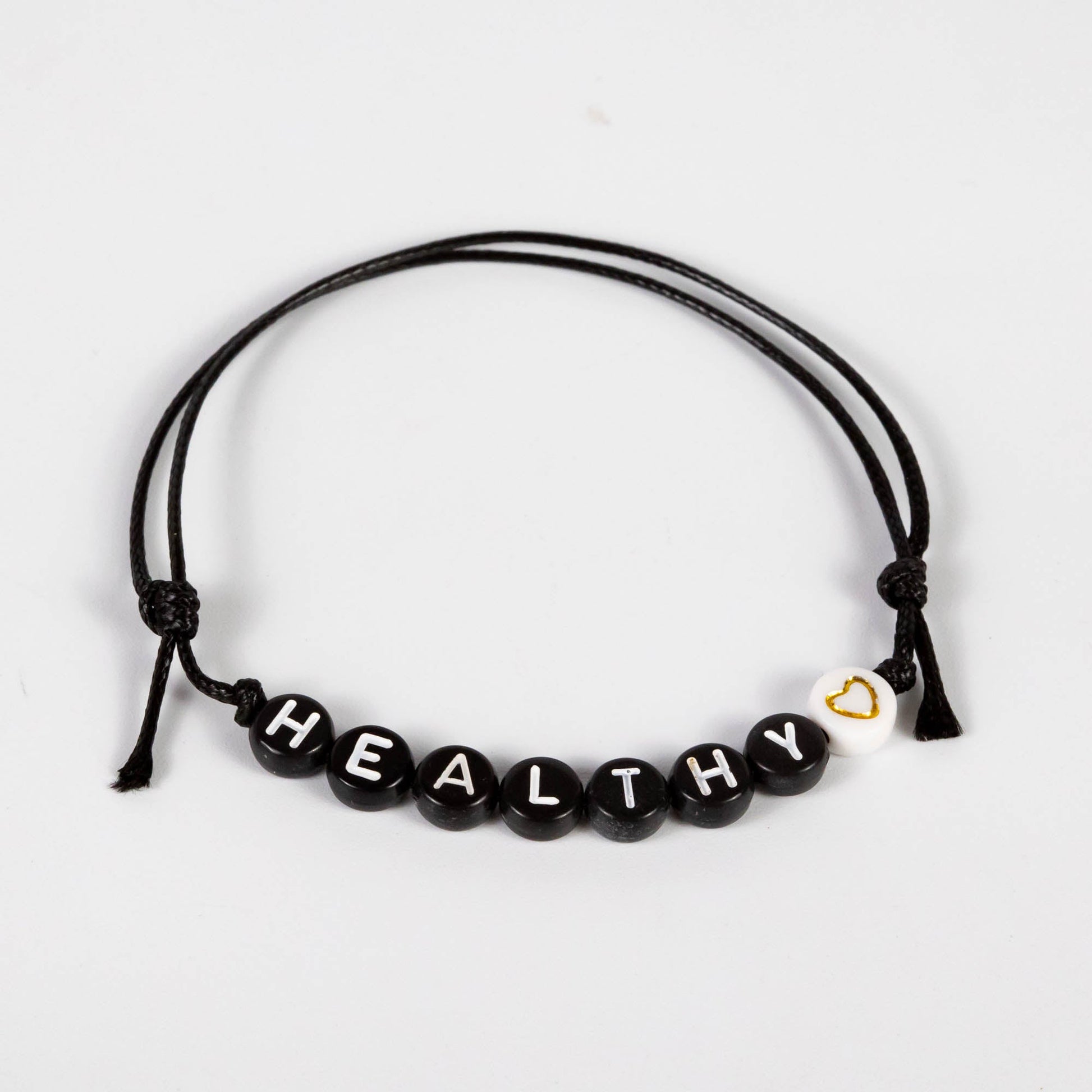 Wholesale 10Pcs 'Healthy' Text On Black Acrylic Beads, Cord Bracelet